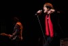 A tribute band impersonating the Rolling Stones performs on the stage at Fox Performing Arts Center