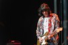 A tribute band impersonating the Rolling Stones performs on the stage at Fox Performing Arts Center