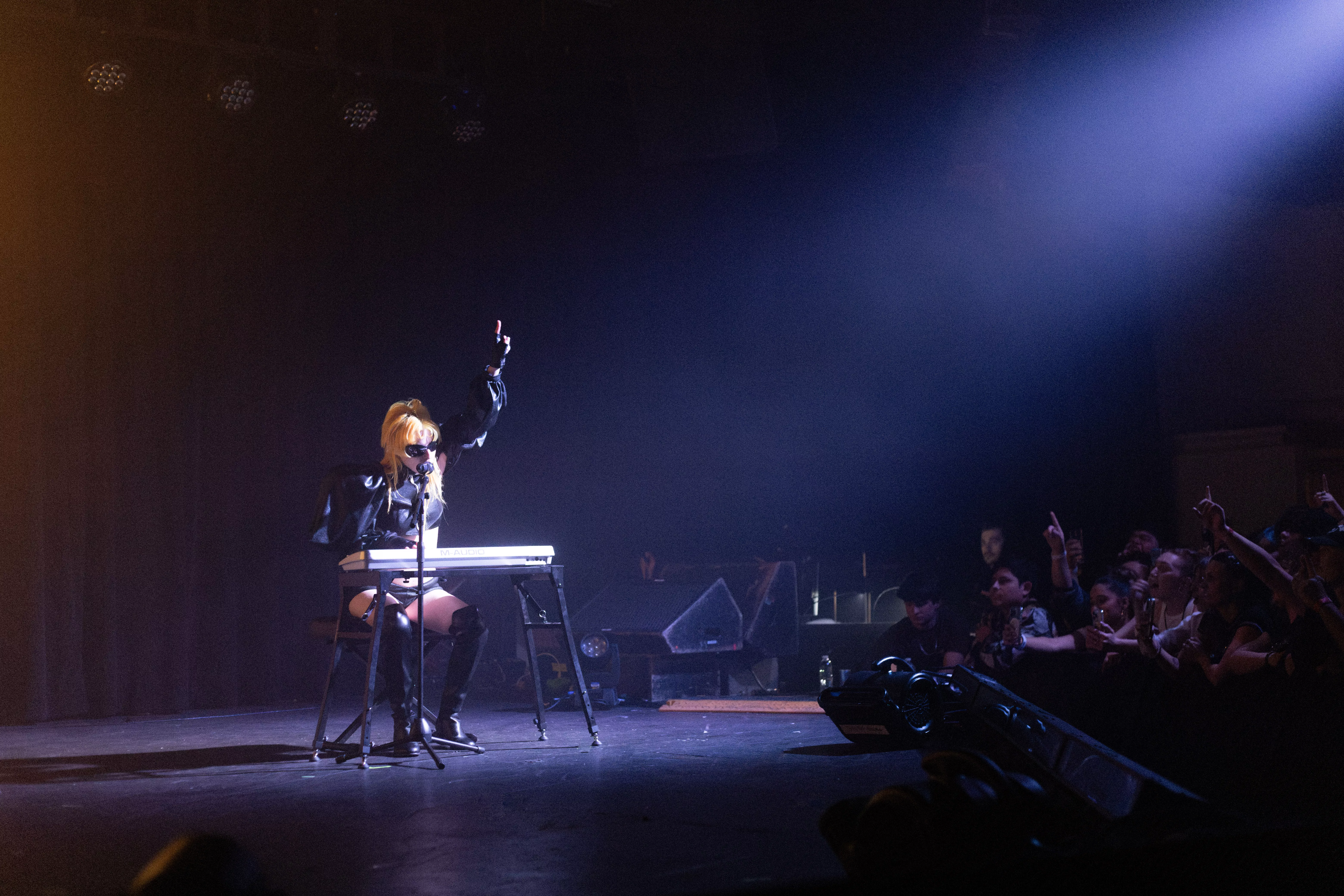 Dorian Electra plays the keyboard on stage