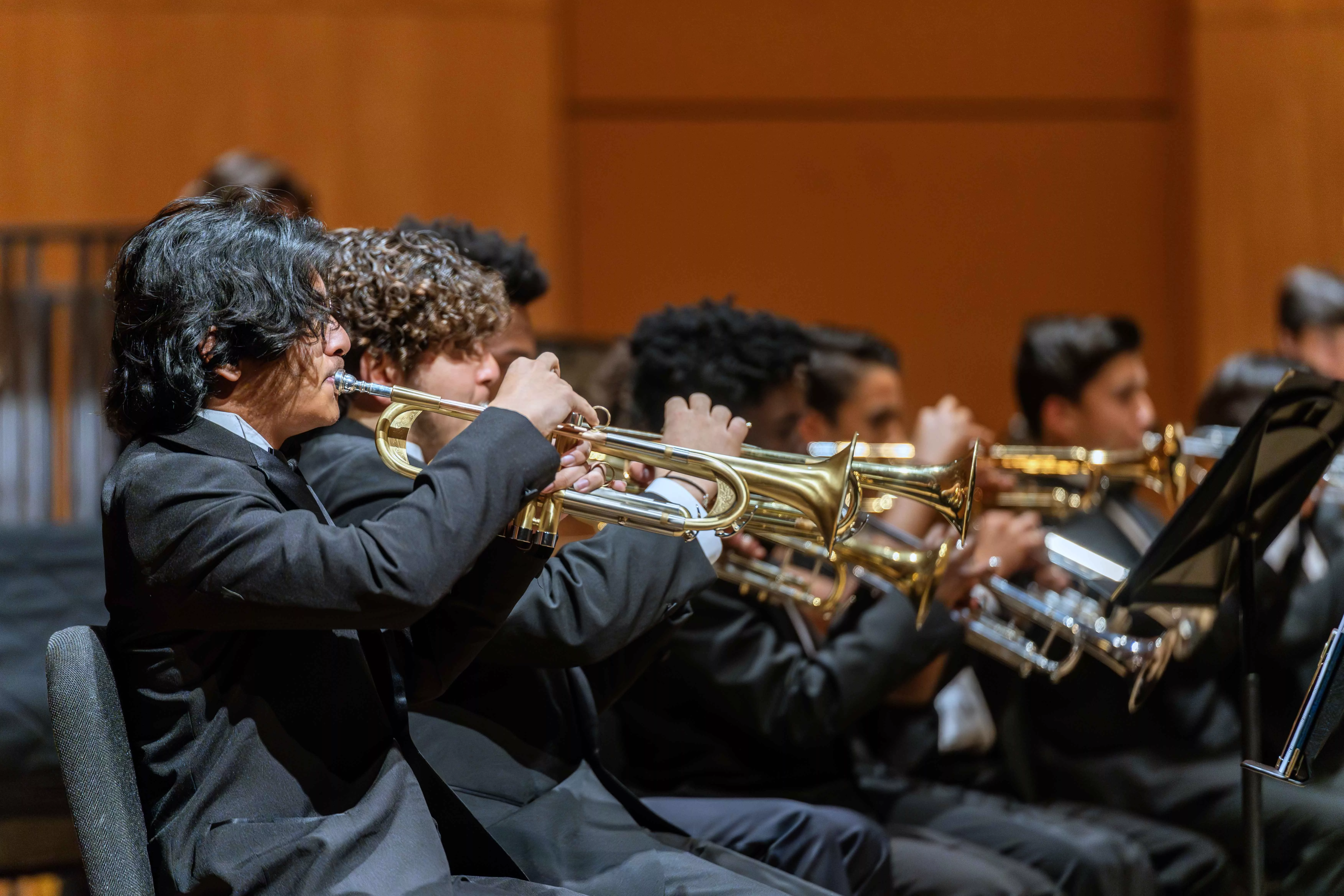 Student from Riverside City College Wind Ensemble perform on stages