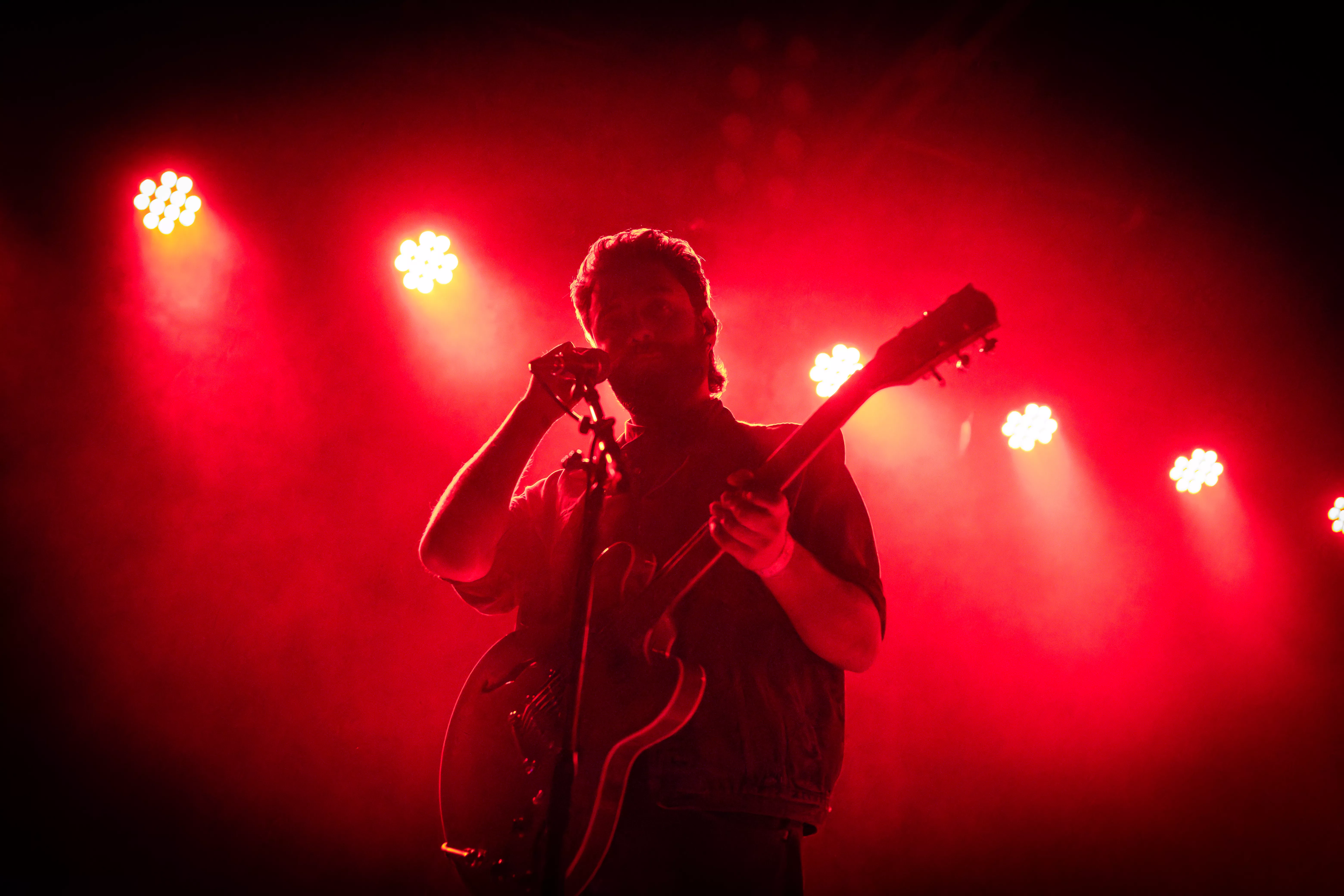 Guitarist plays on stage