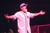 Fred Durst opens his arms on stage welcoming his fans