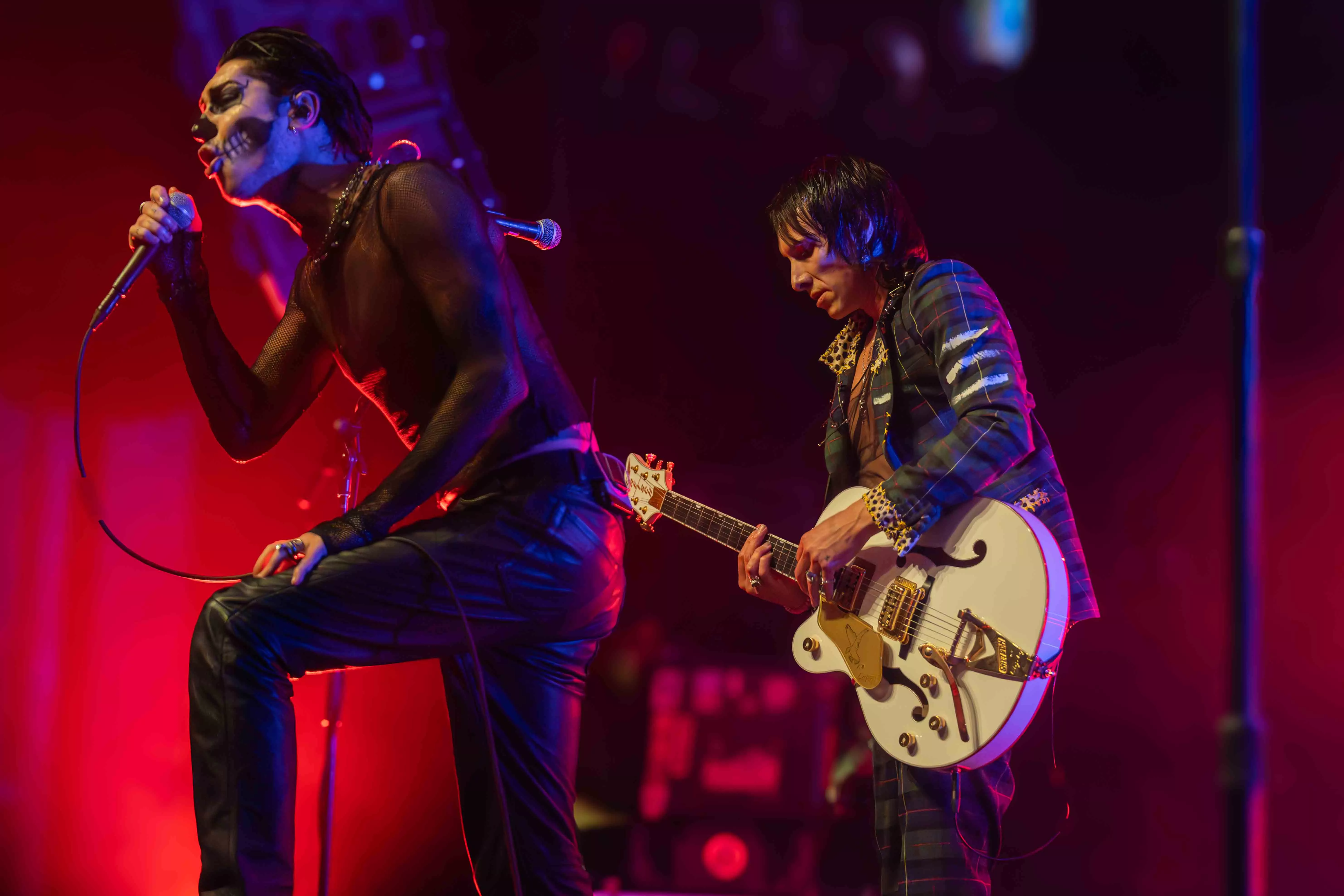 A singer and a guitarist perform on stage at the House of Blues in Anaheim Ca