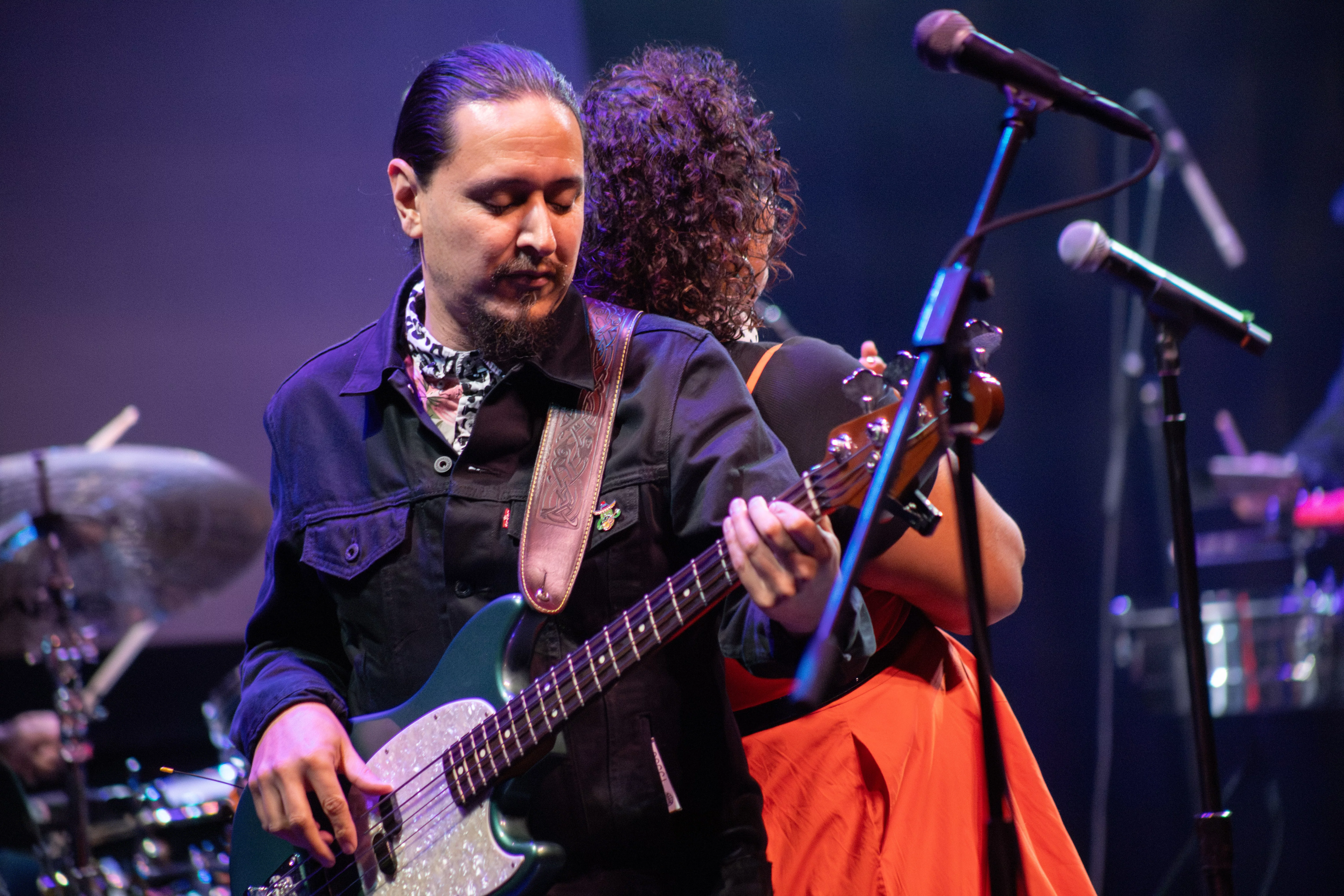 La Santa Cecilia performs on stage