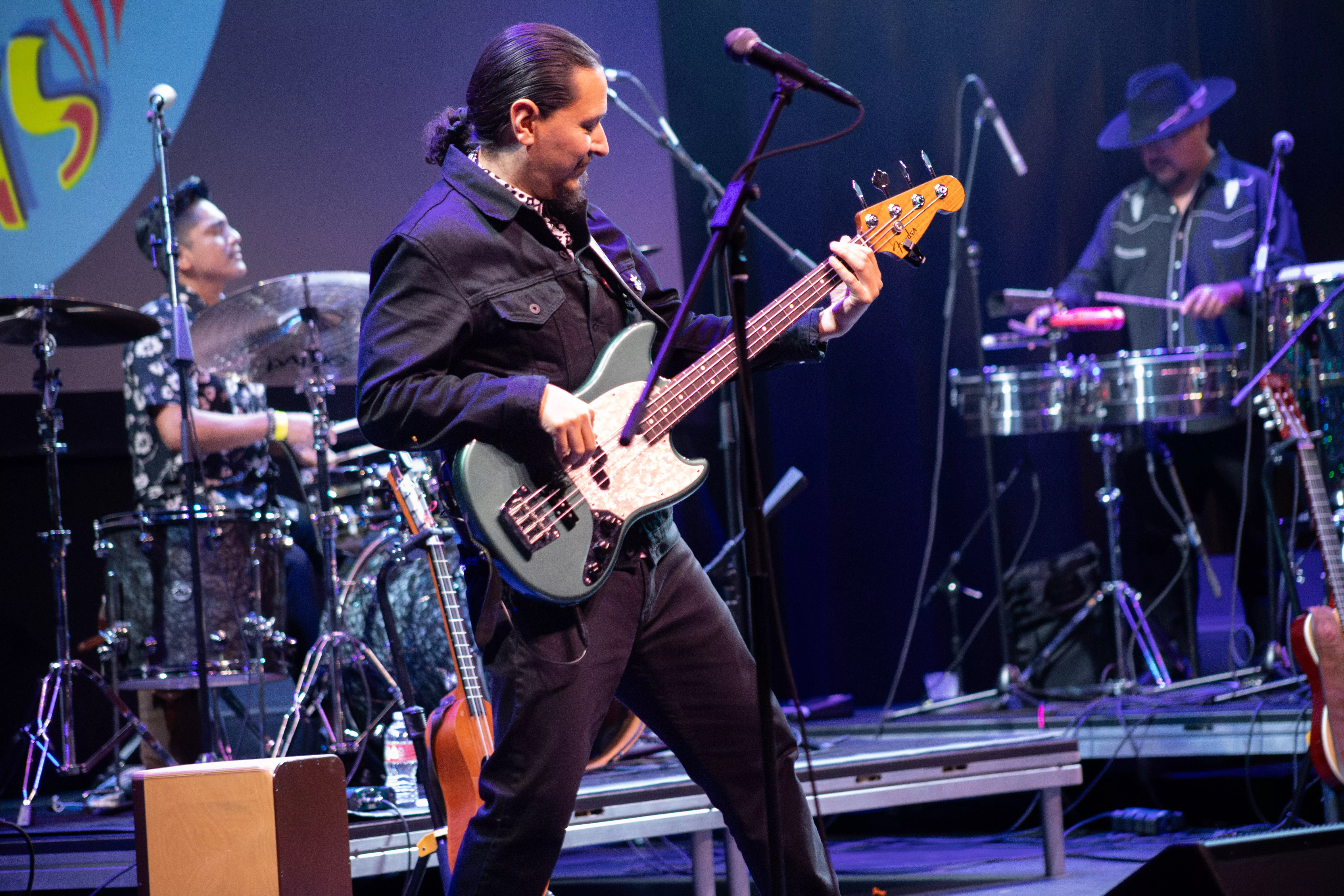 La Santa Cecilia performs on stage