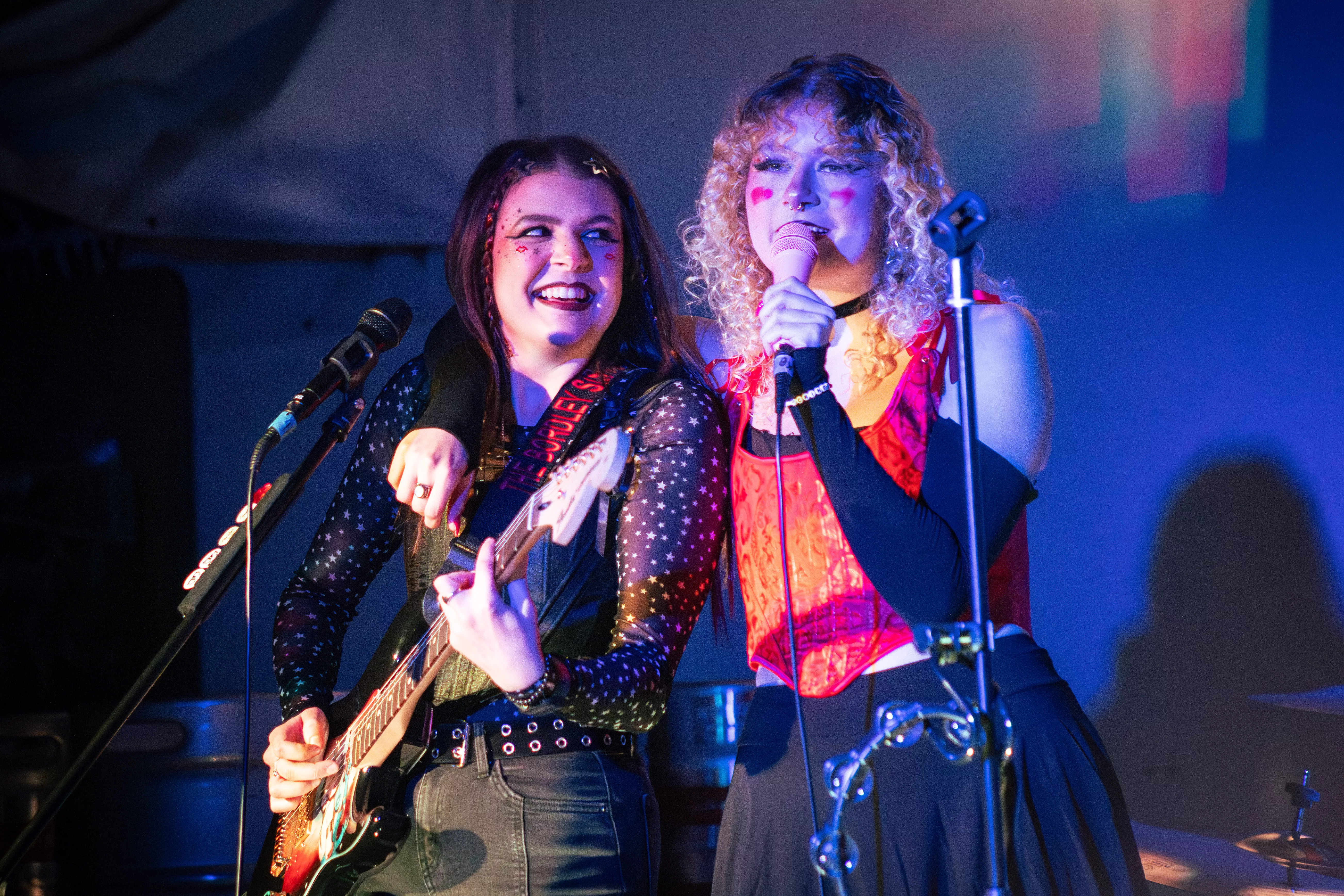 Natalie and Kelly perform together on stage