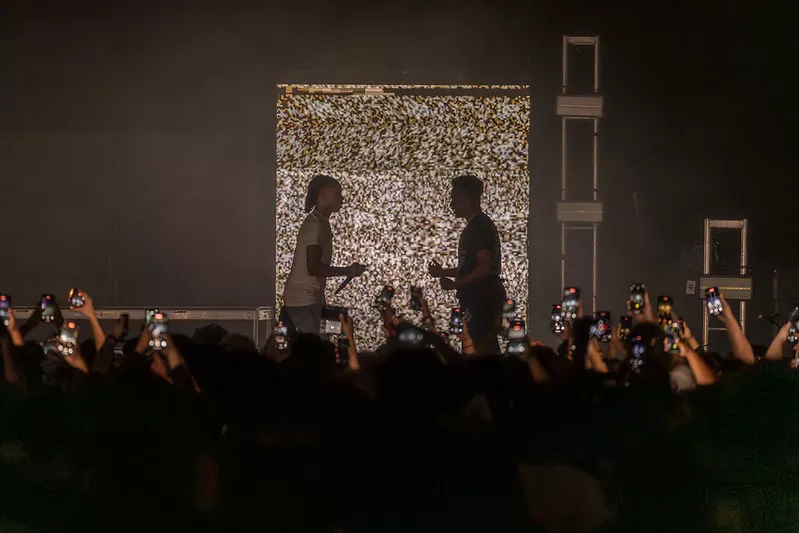 Artists perform on stage at the Riverside Municipal Auditorium