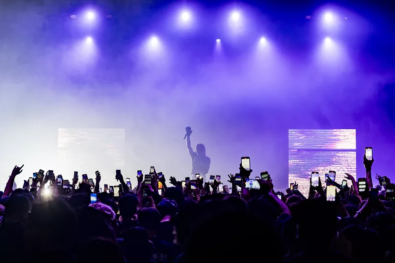 Artists perform on stage at the Riverside Municipal Auditorium