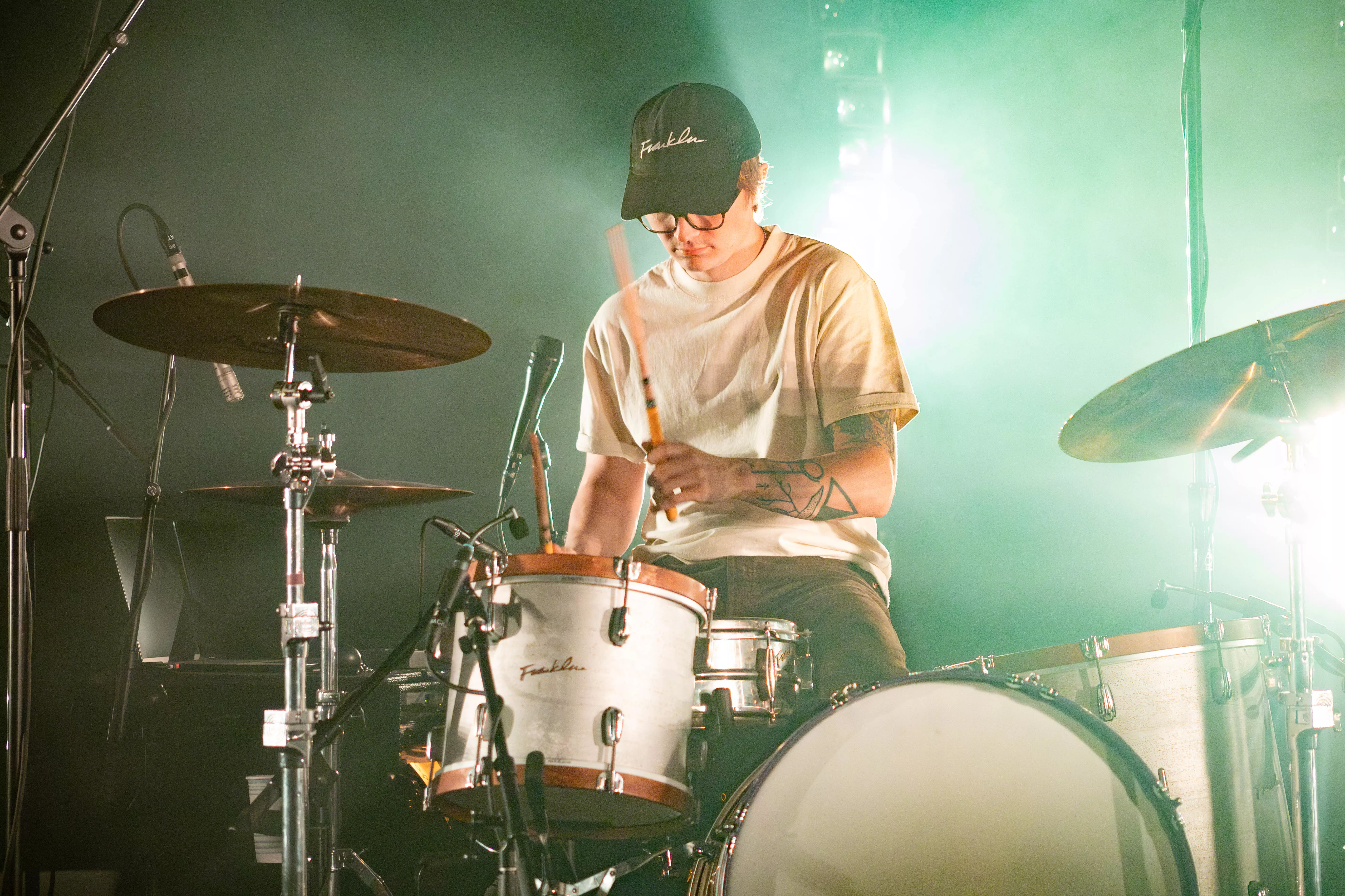 Whistler Allen the drummer of Hippo Campus performs on stage