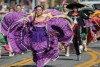 Folklorico dancers dance down the parade route at Palm Springs Pride on Nov 4 in Palm Springs