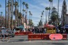 A palm tree lined street is closed off for the lunar new year festival