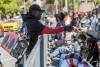 Parade marchers take part in the Black History Month parade