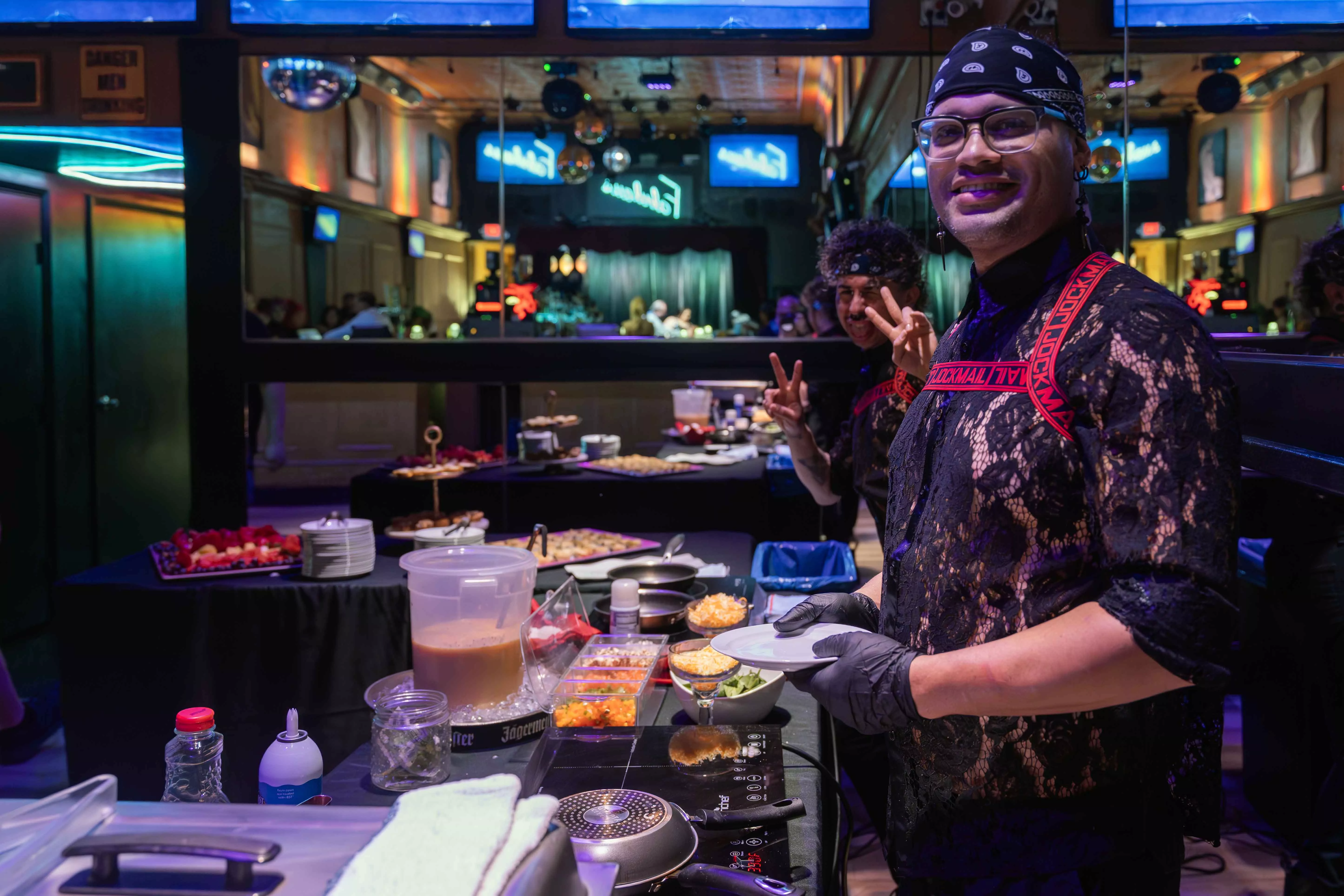 Drag Queens perform in a bar for Drag Brunch