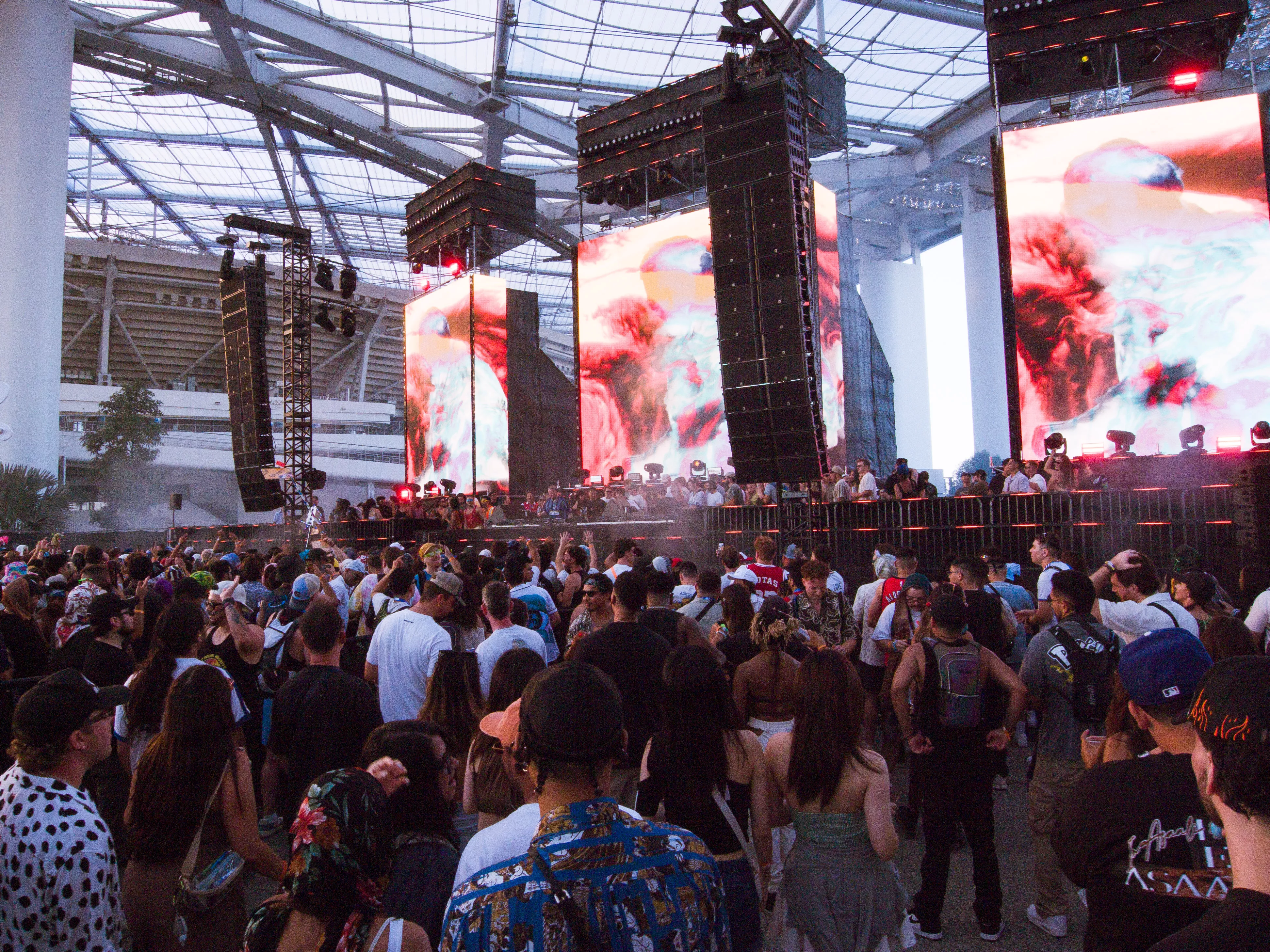 Festival attendees enjoy the music in the shade at Hard Summer at Hollywood Park in Inglewood Ca on August 3rd 2024