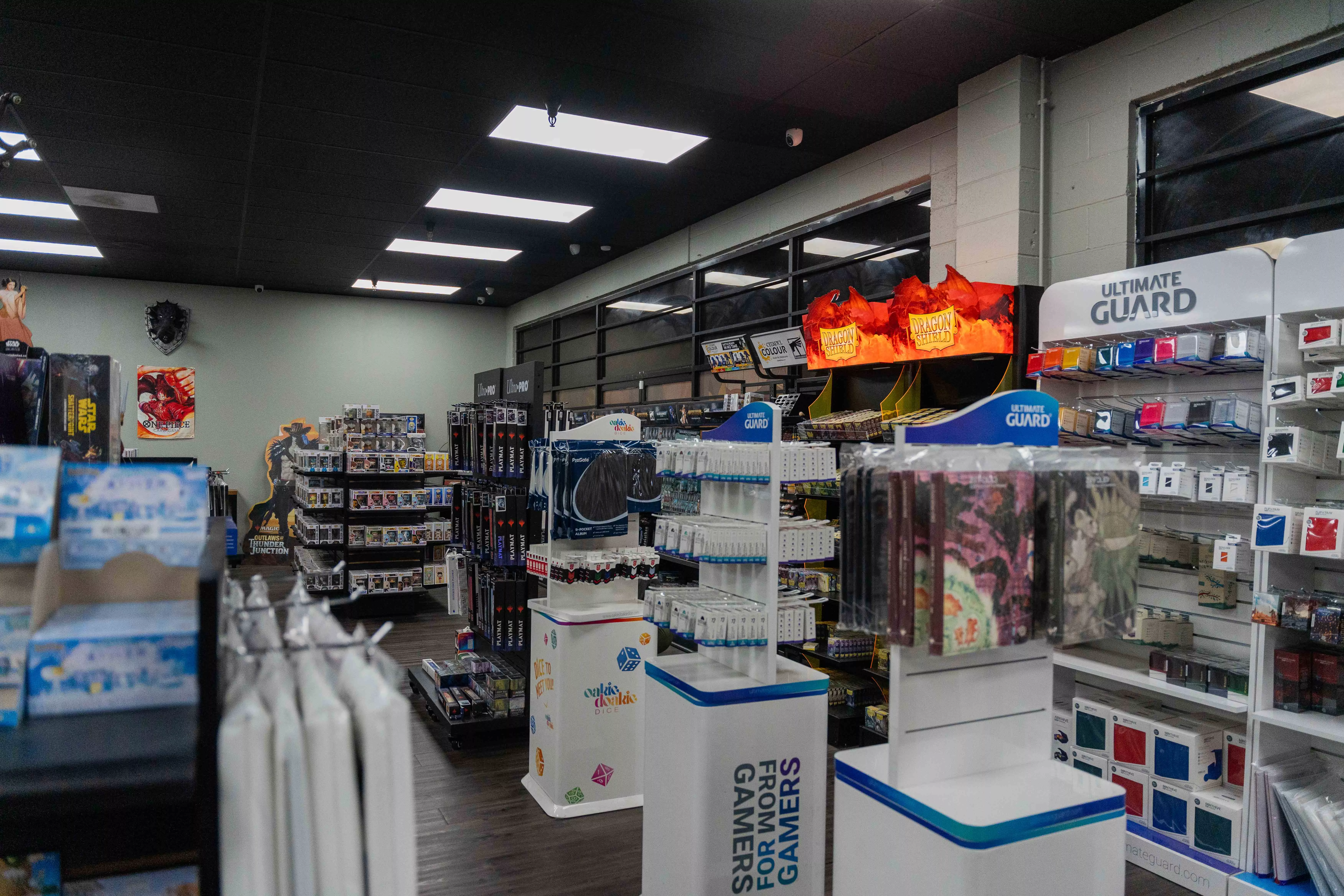 The interior of Top Deck Keeps sales floor offering all the supplies and accessories you need for your favorite table top gaming session in Riverside CA on Nov 24