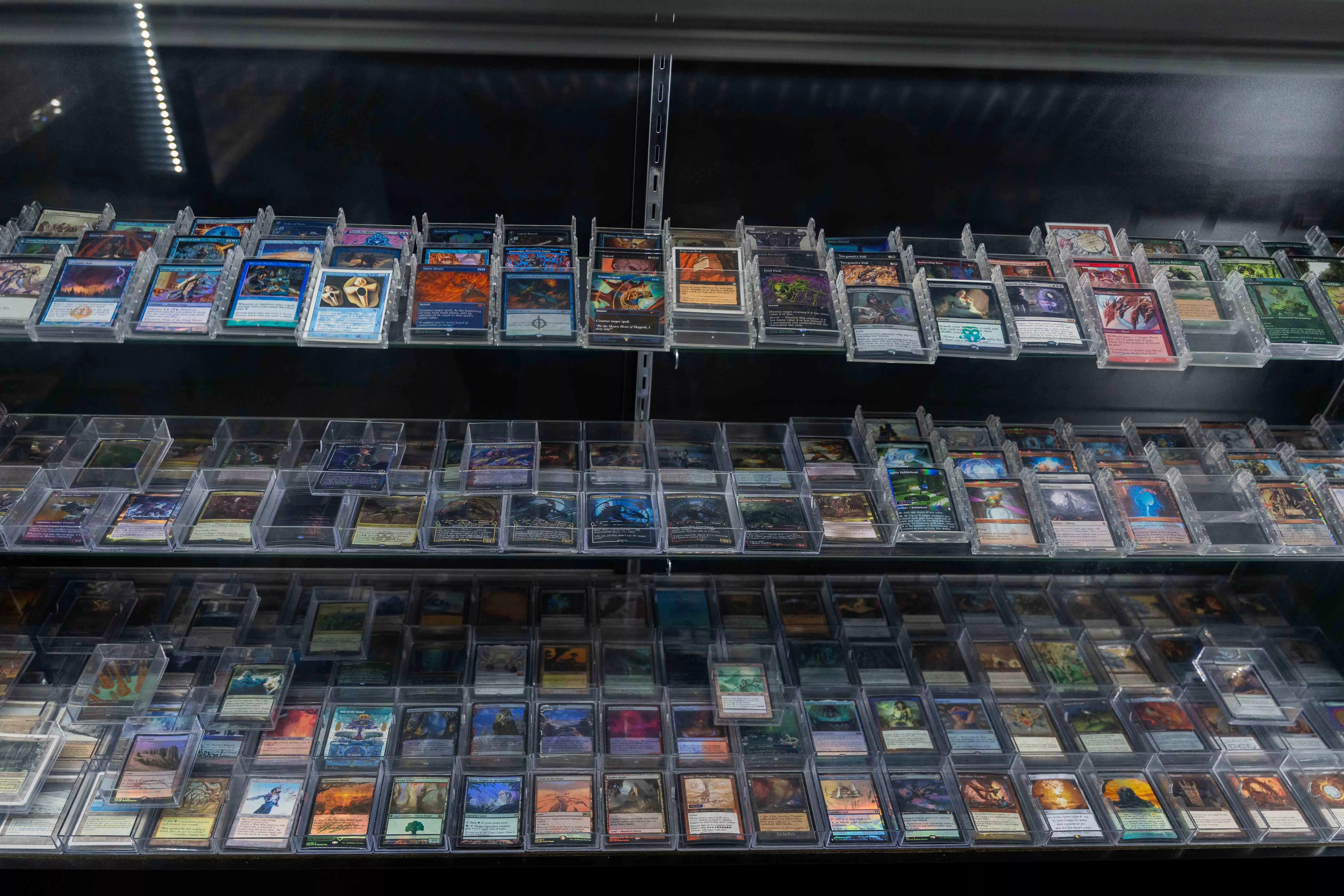 A display of collector level magic cards that are available for sale at Top Deck Keep in Riverside Ca on Nov 24