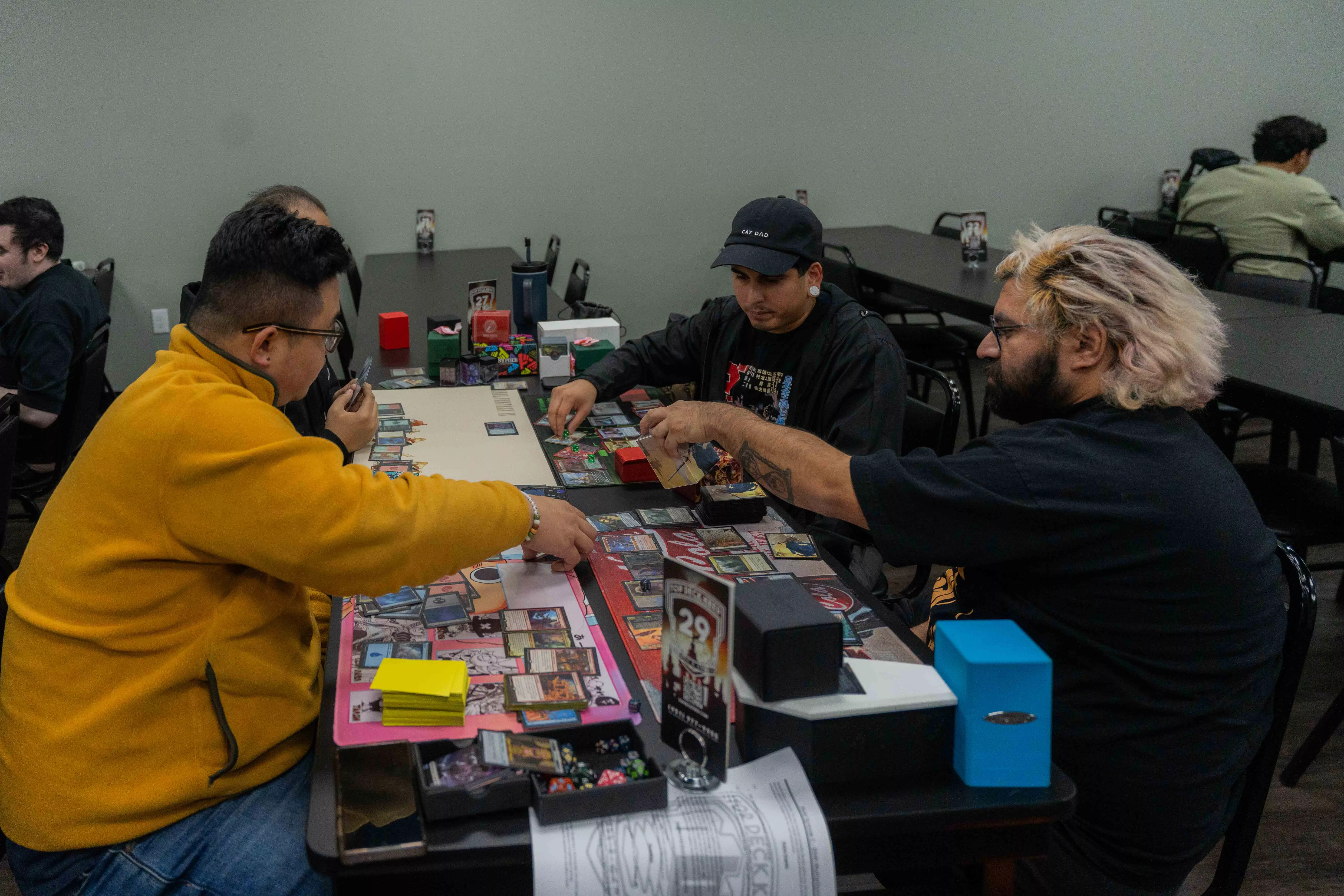 A group plays Magic the Gathering in the gaming area of Top Deck Keep in Riverside Ca on Nov 24