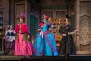 Cast members preform on stage in a produciton of Cinderella