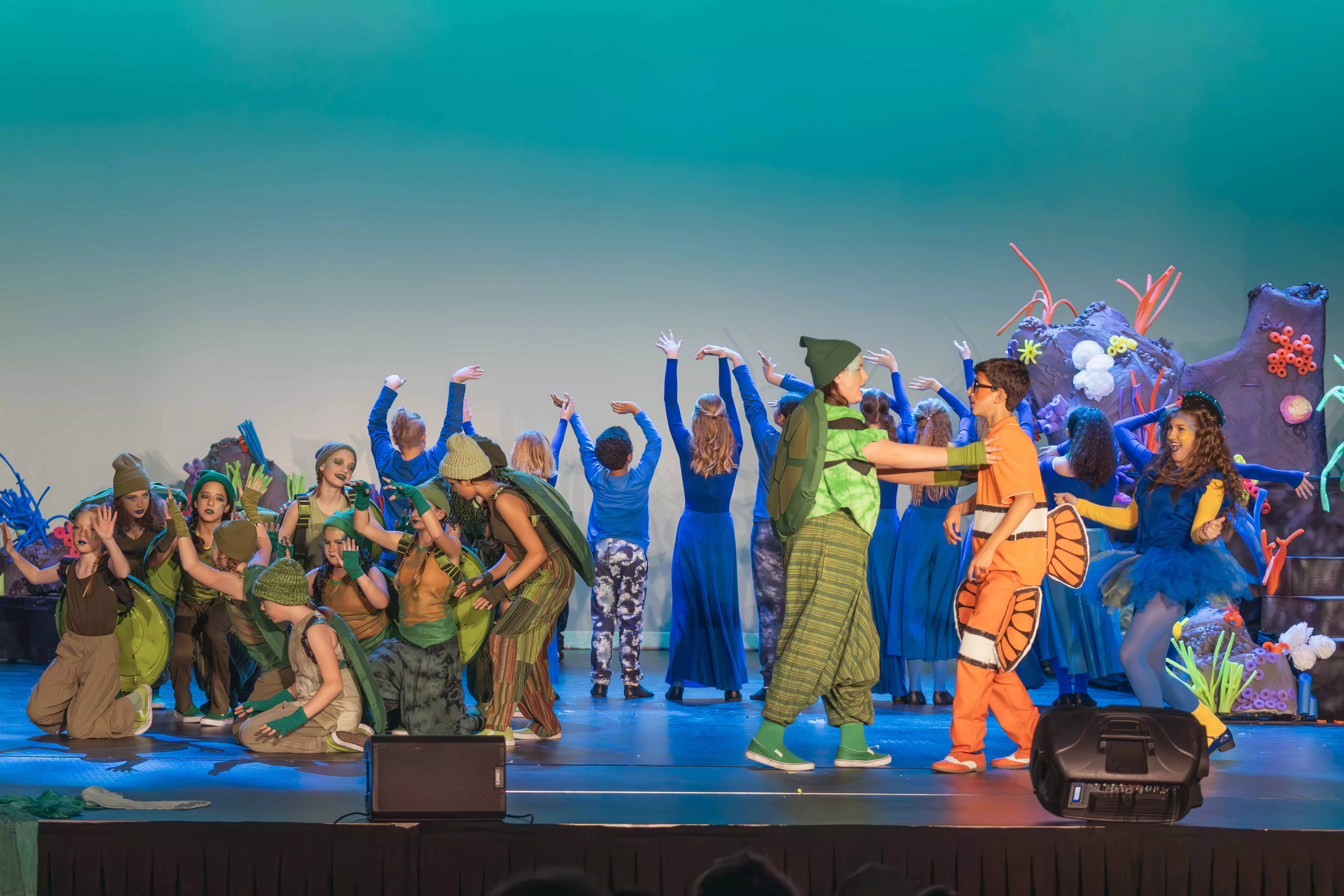 Children in a Finding Nemo costumes performing a play