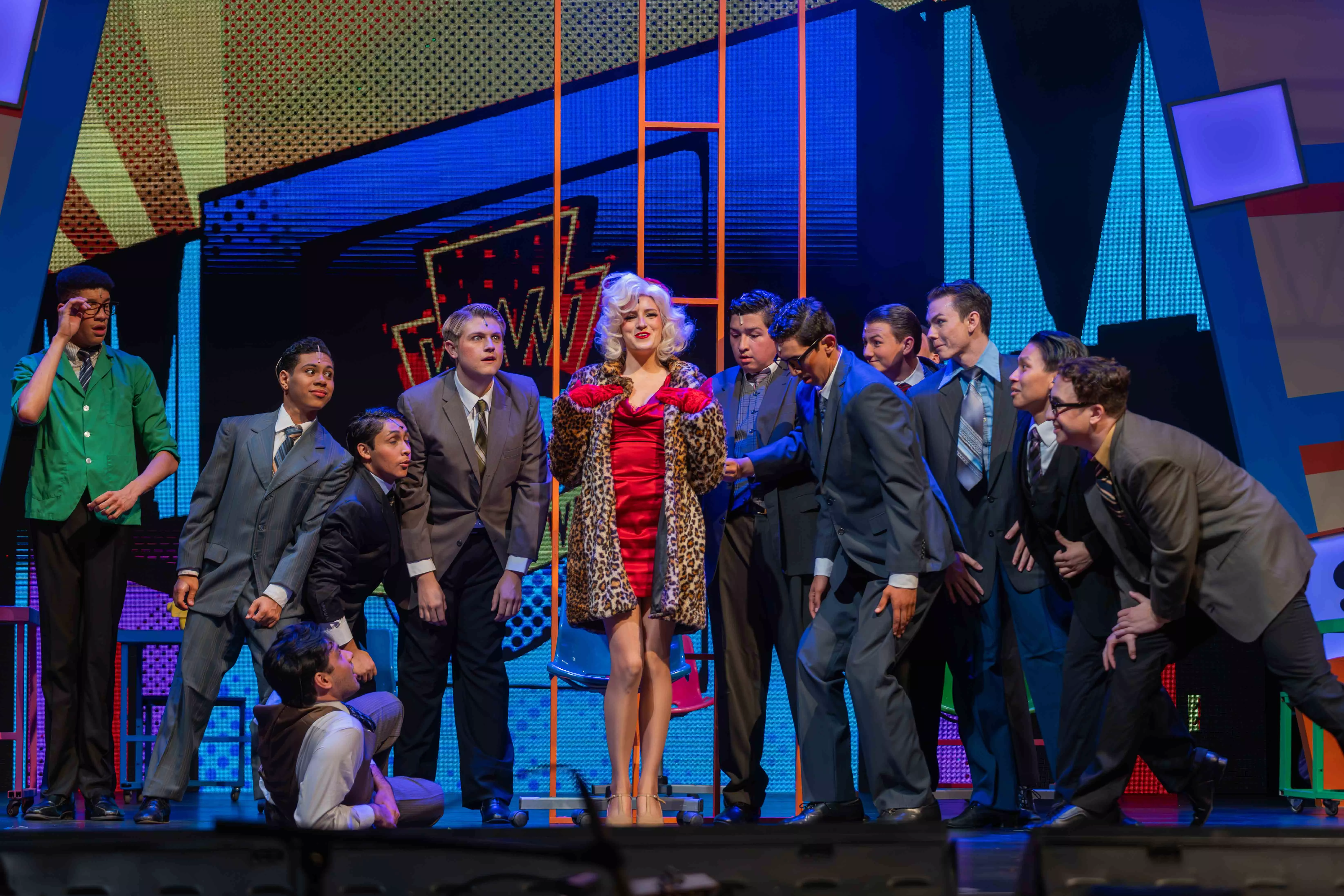 Actors perform a scene from How to Succeed at Business Without Really Trying in the Landis Auditorium at Riverside City College on Nov 5