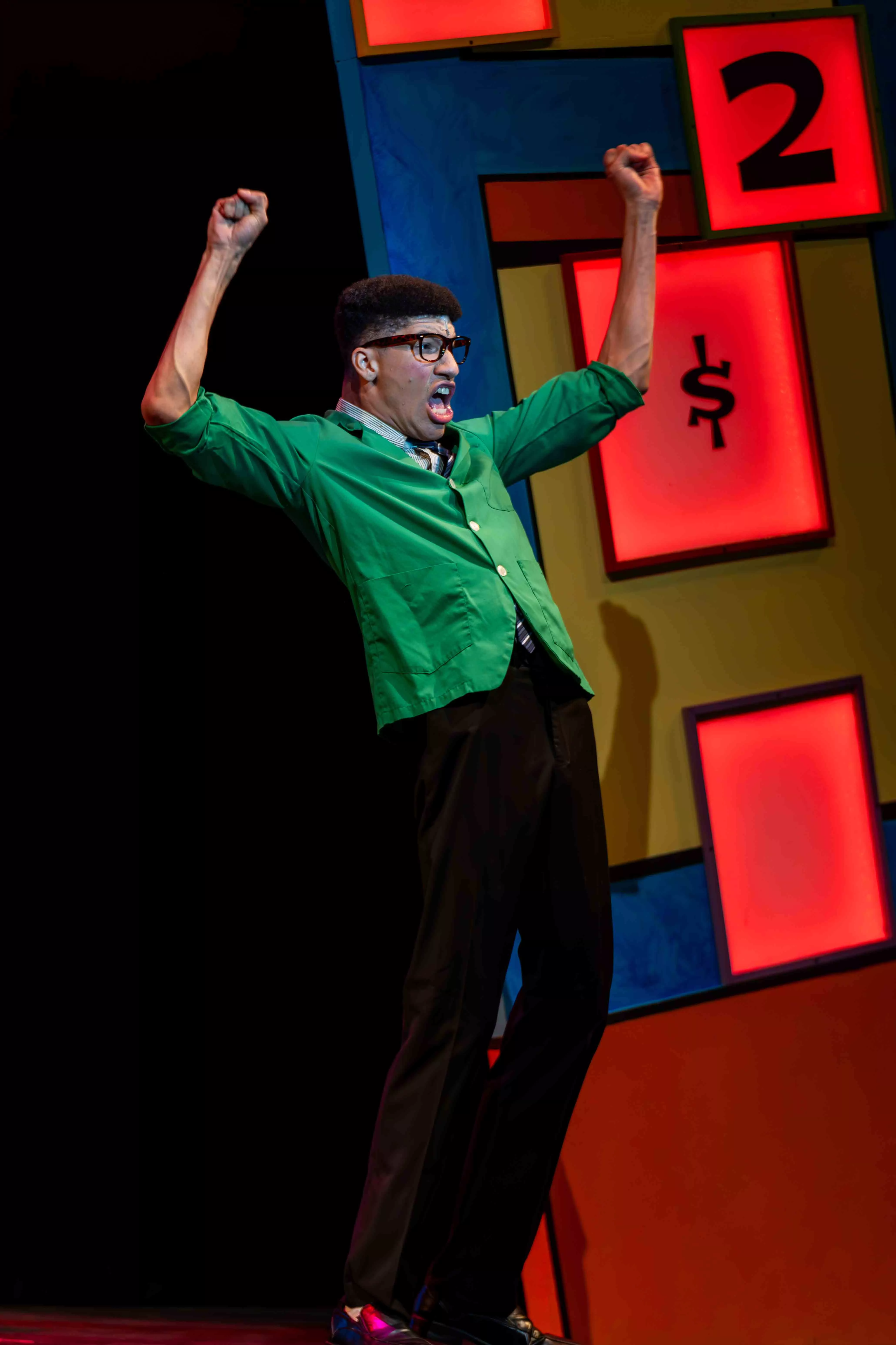 Actors perform a scene from How to Succeed at Business Without Really Trying in the Landis Auditorium at Riverside City College on Nov 5