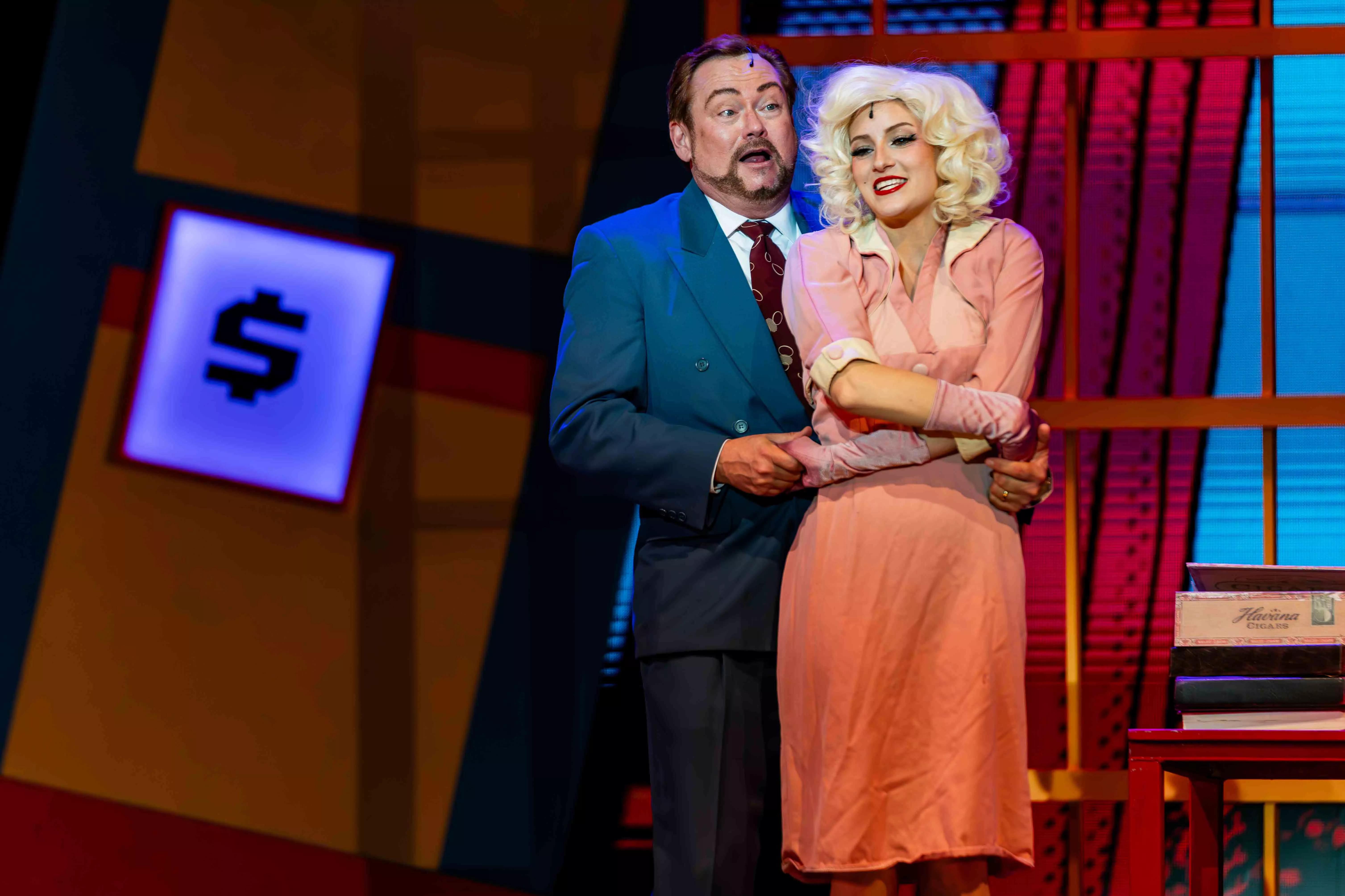 Actors perform a scene from How to Succeed at Business Without Really Trying in the Landis Auditorium at Riverside City College on Nov 5