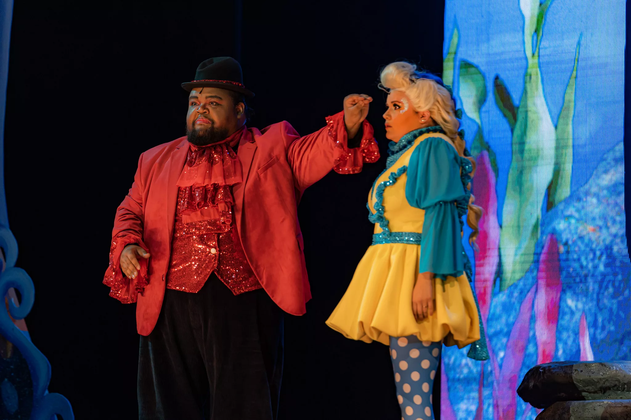 Actors playing the parts of Sebastian and Flounder from the Little Mermaid