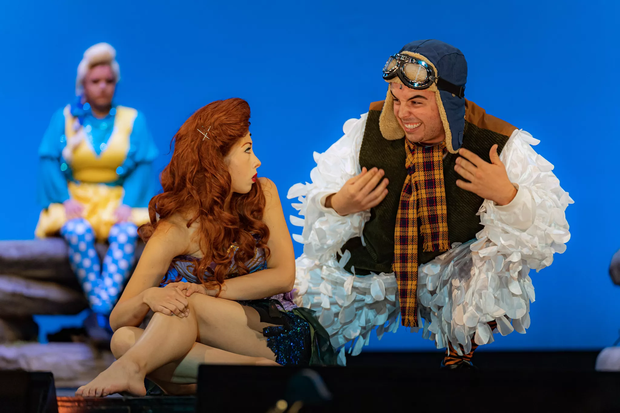 Actors playing the parts of Ariel Scuttle and Flounder from the Little Mermaid